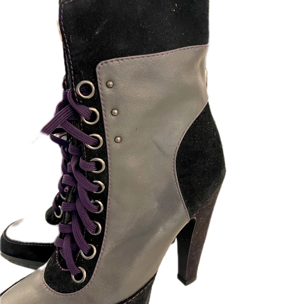 Collin Stewart sext lace up boots.